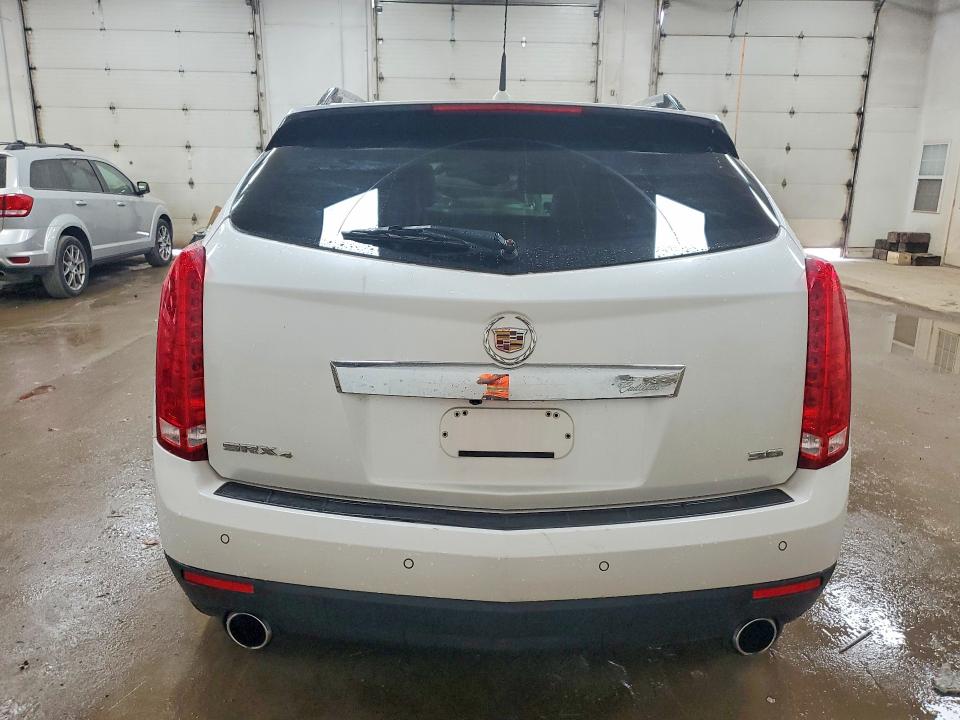 Photo 6 from auction – 2014 CADILLAC SRX with VIN 3GYFNFE32ES658043