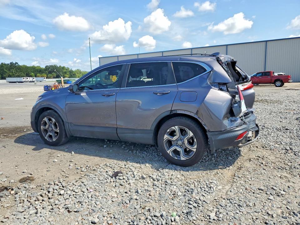 Photo 2 from auction – 2018 HONDA CR-V with VIN 7FARW1H81JE044165