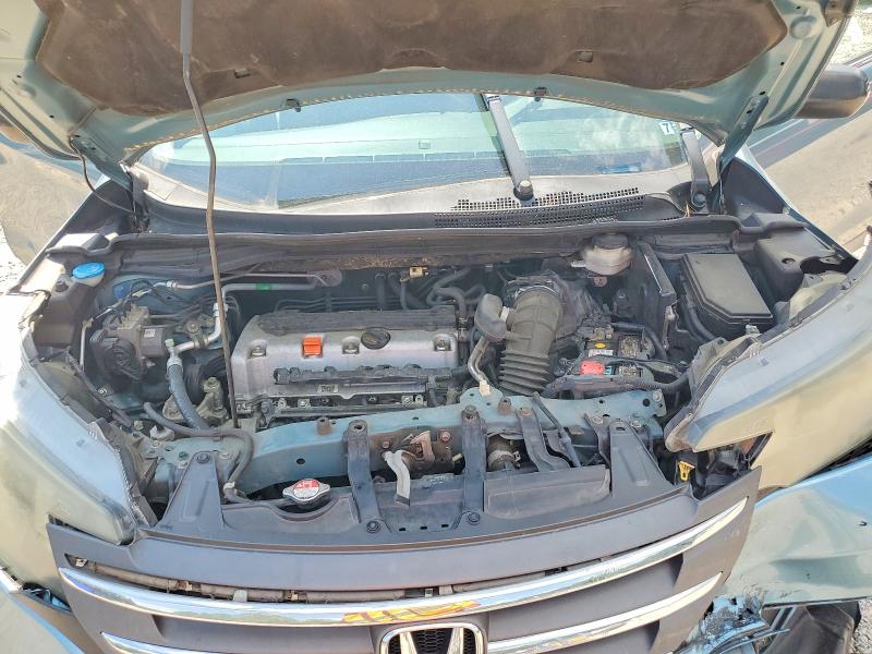 Photo 12 from auction – 2014 HONDA CR-V with VIN 2HKRM3H36EH525375