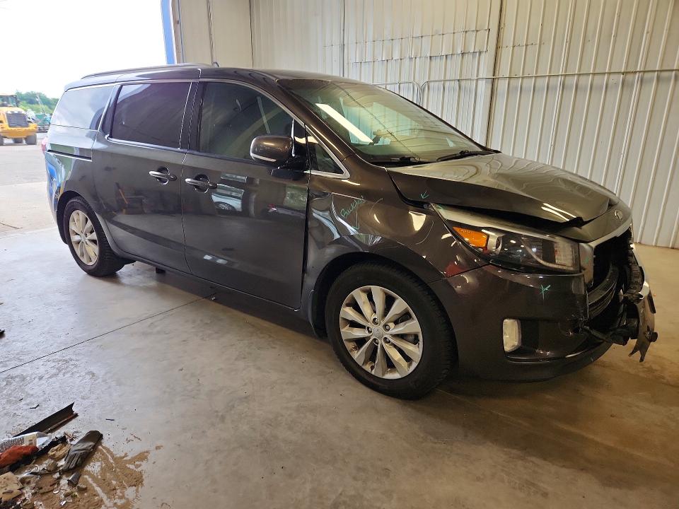 Photo 4 from auction – 2015 KIA SEDONA with VIN KNDMC5C19F6033076