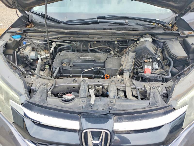 Photo 11 from auction – 2016 HONDA CR-V with VIN 3CZRM3H58GG720143