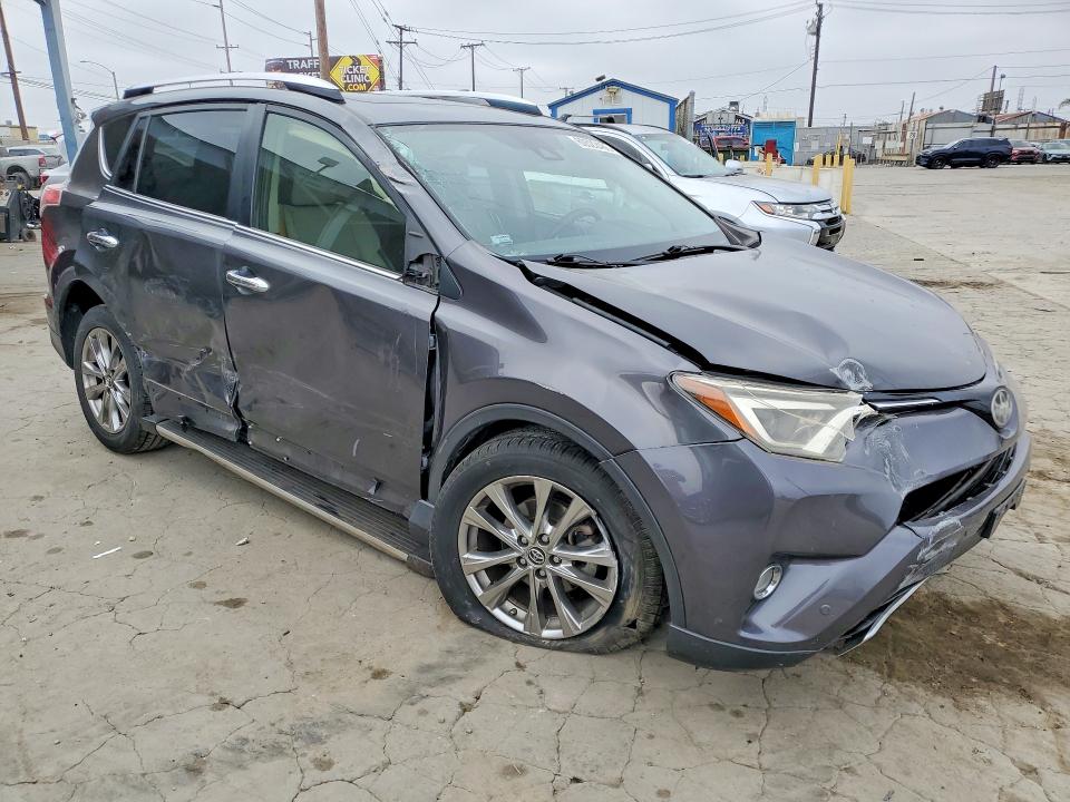 Photo 4 from auction – 2016 TOYOTA RAV4 with VIN JTMYFREV8GJ062051