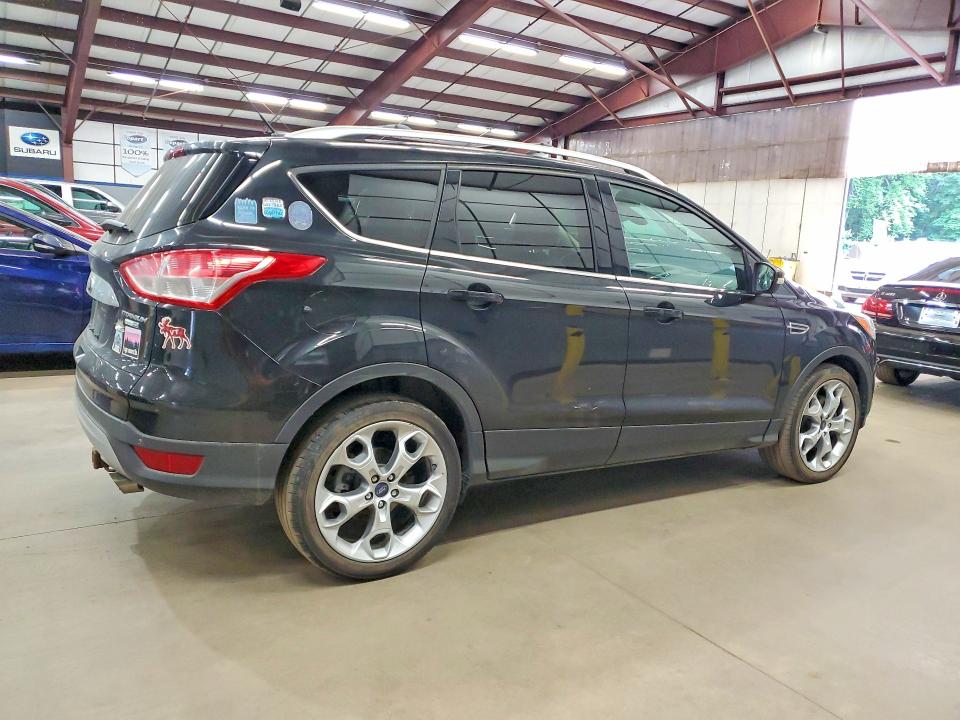 Photo 3 from auction – 2014 FORD ESCAPE with VIN 1FMCU9JX3EUD35203