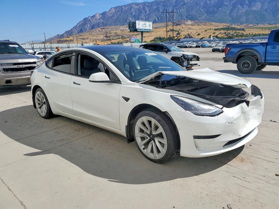Photo 4 from auction – 2022 TESLA MODEL 3 with VIN 5YJ3E1EB1NF128559