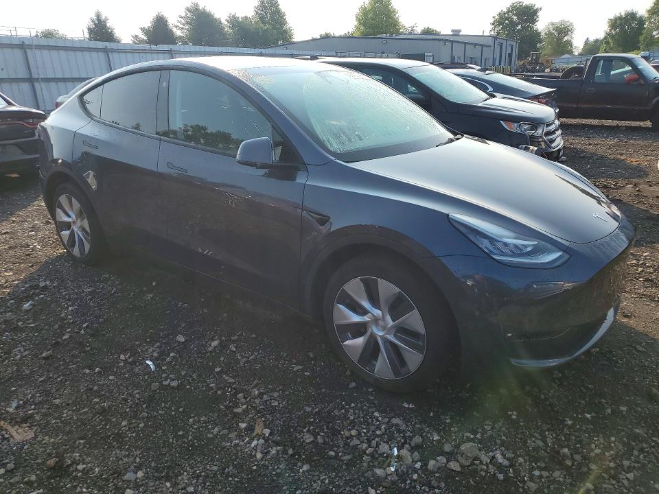 Photo 4 from auction – 2022 TESLA MODEL Y with VIN 7SAYGDEE6NF401901