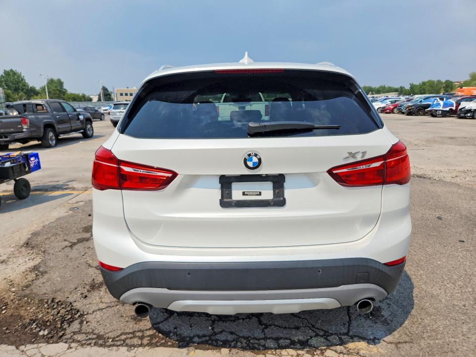 Photo 6 from auction – 2016 BMW X1 with VIN WBXHT3C3XG5E50971