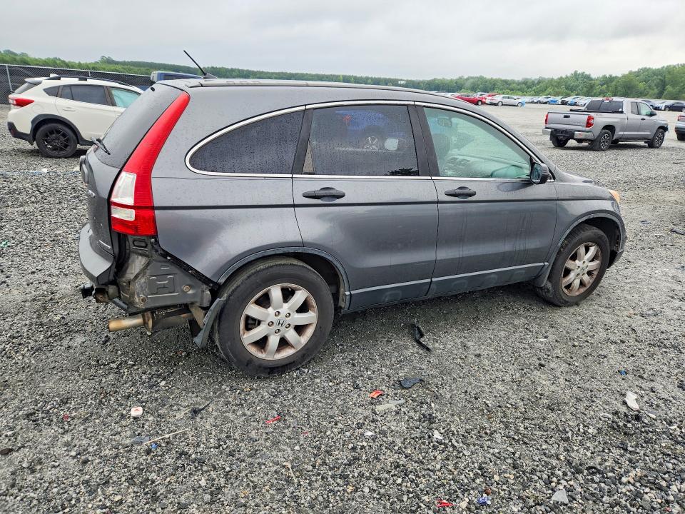 Photo 3 from auction – 2011 HONDA CR-V with VIN 5J6RE4H42BL021189