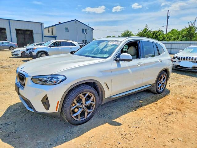 BMW X3 2022 with VIN 5UX53DP0XN9M95691 - Photo from auction