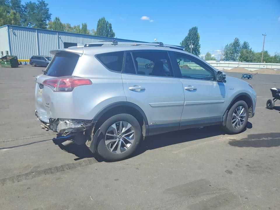 Photo 3 from auction – 2016 TOYOTA RAV4 HV with VIN JTMRJREV6GD043824