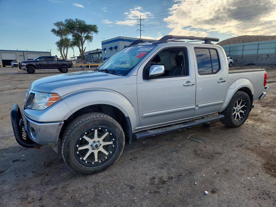 NISSAN FRONTIER 2010 with VIN 1N6AD0EV1AC423521 - Photo from auction