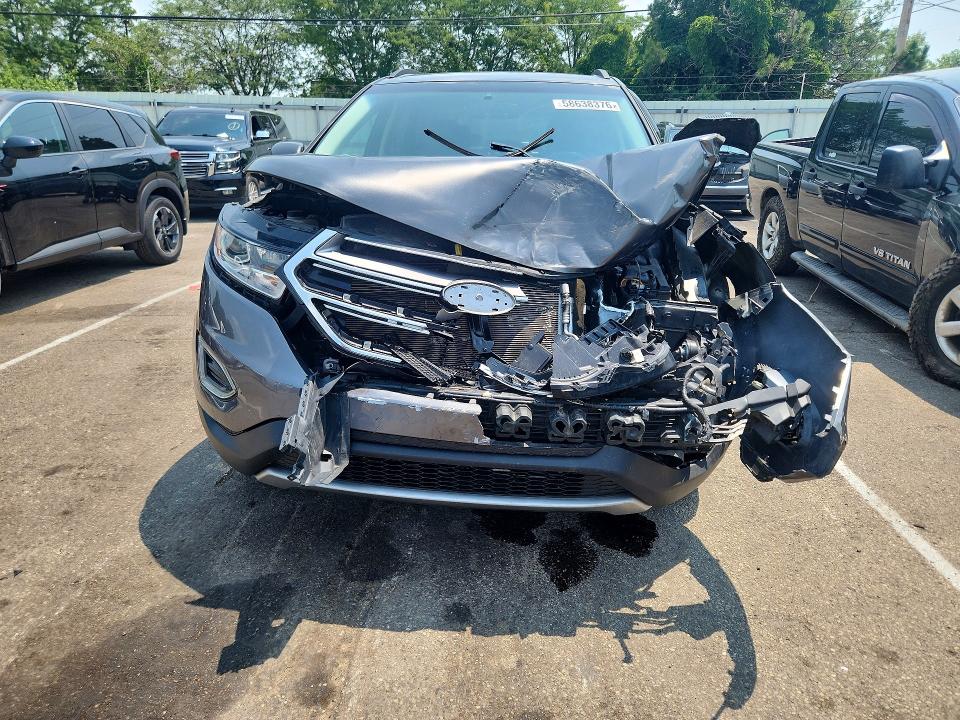 Photo 5 from auction – 2016 FORD EDGE with VIN 2FMPK4J90GBC65647
