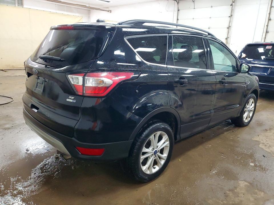 Photo 3 from auction – 2018 FORD ESCAPE with VIN 1FMCU9GD5JUB52134
