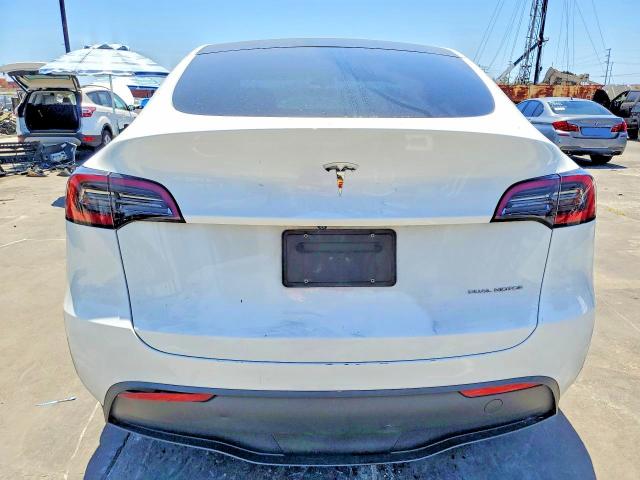 Photo 6 from auction – 2023 TESLA MODEL Y with VIN 7SAYGDEE6PA040542