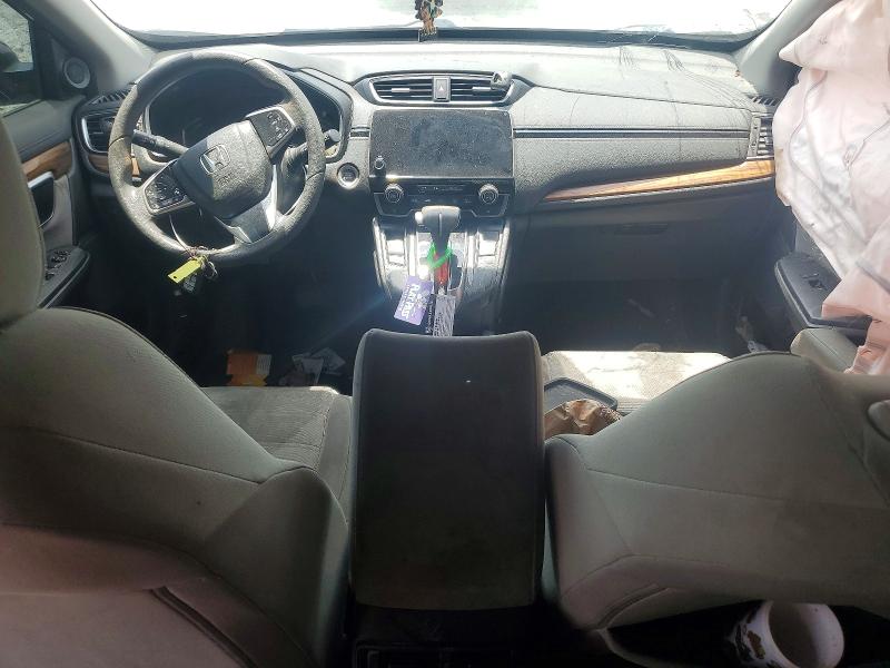 Photo 8 from auction – 2017 HONDA CR-V with VIN 7FARW1H55HE028583