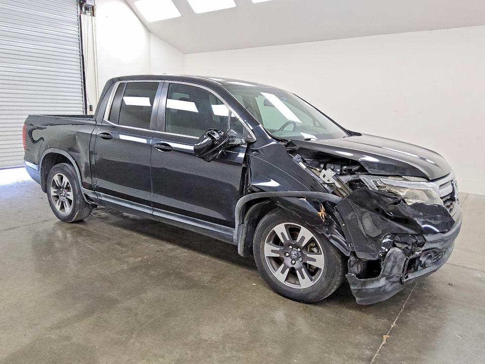 Photo 4 from auction – 2017 HONDA RIDGELINE with VIN 5FPYK2F66HB006250