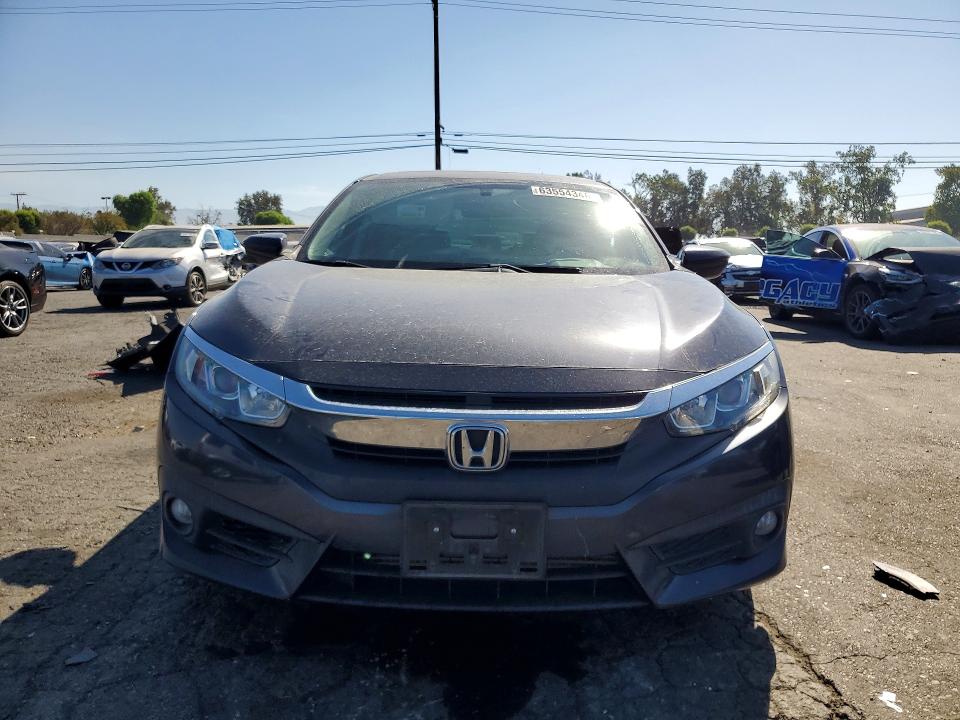 Photo 5 from auction – 2018 HONDA CIVIC with VIN JHMFC1F35JX014332