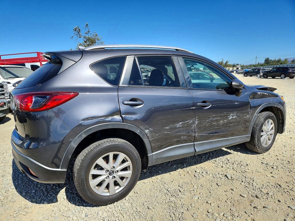 Photo 3 from auction – 2016 MAZDA CX-5 with VIN JM3KE2CY0G0854270