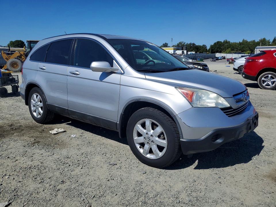 Photo 4 from auction – 2009 HONDA CR-V with VIN 5J6RE48759L059908