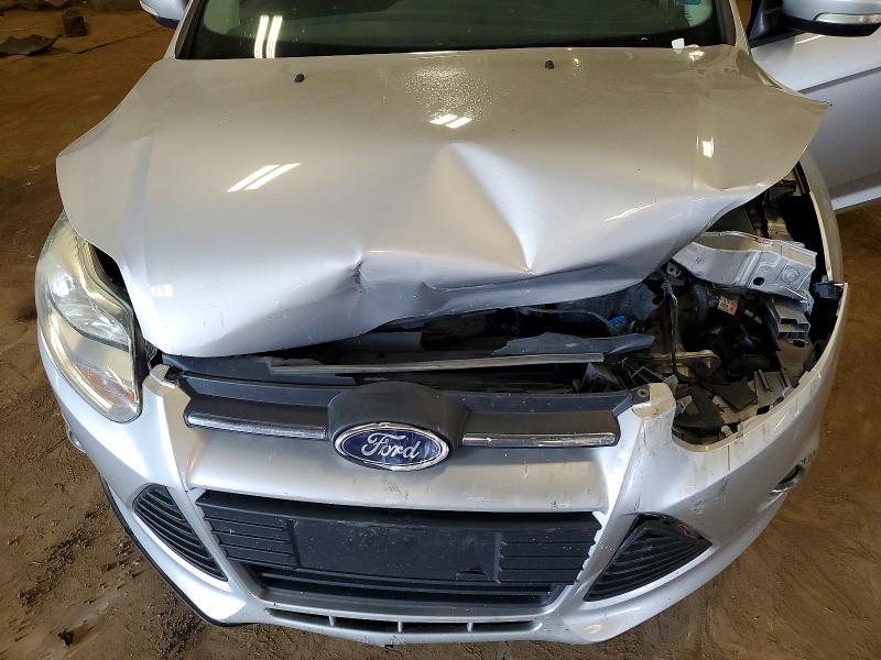 Photo 11 from auction – 2014 FORD FOCUS with VIN 1FADP3F29EL217758