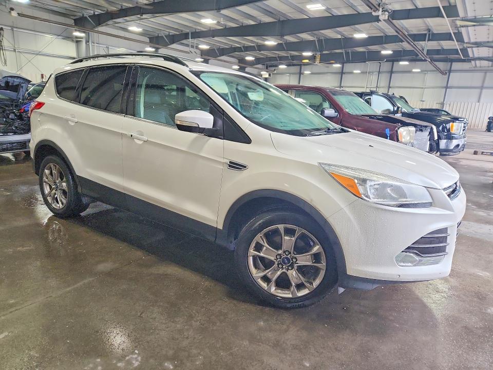 Photo 4 from auction – 2013 FORD ESCAPE with VIN 1FMCU0HX7DUB08435
