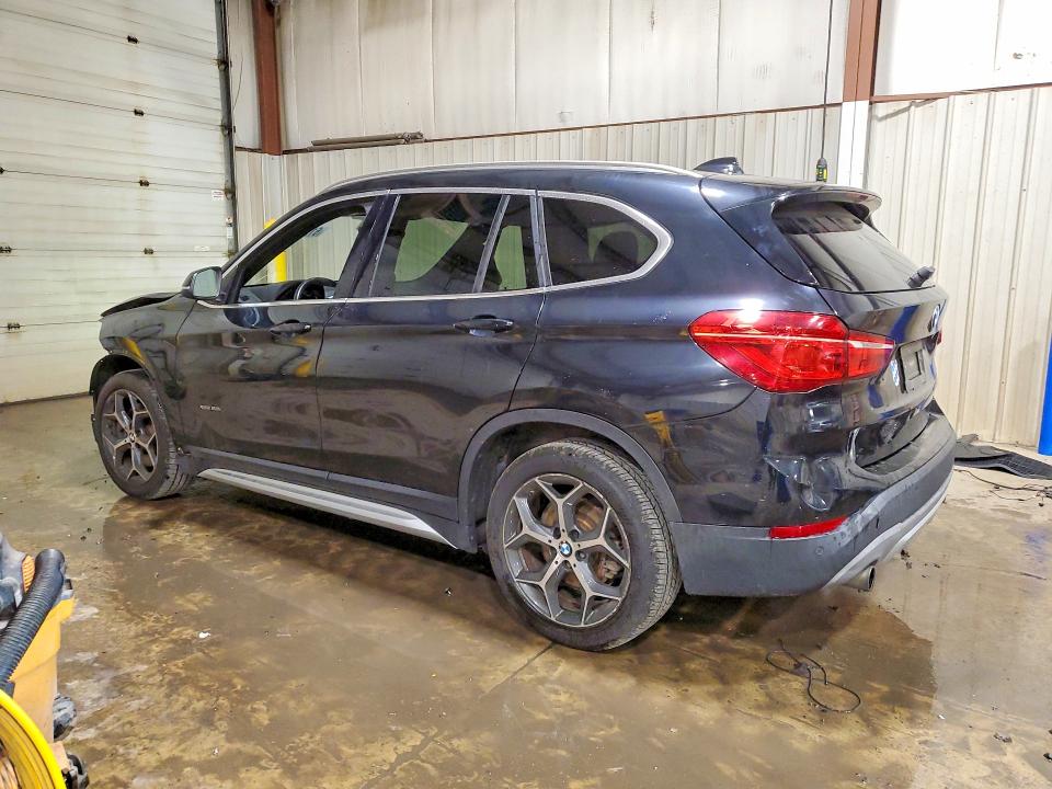 Photo 2 from auction – 2016 BMW X1 with VIN WBXHT3C31GP883886