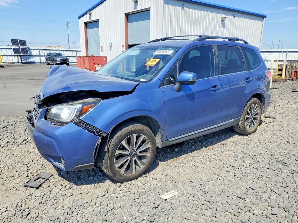 SUBARU FORESTER 2017 with VIN JF2SJGWCXHH459986 - Photo from auction