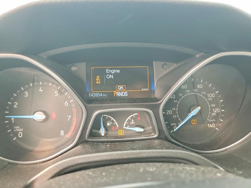Photo 9 from auction – 2015 FORD FOCUS with VIN 1FADP3F20FL268647