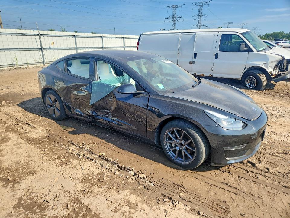 Photo 4 from auction – 2023 TESLA MODEL 3 with VIN 5YJ3E1EAXPF685951