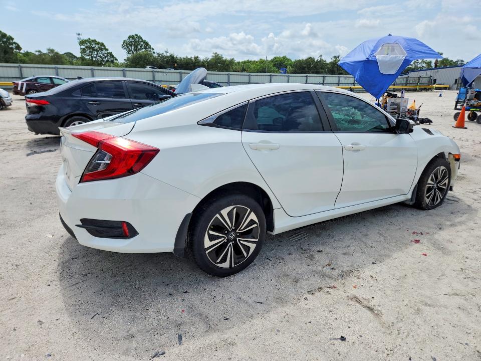 Photo 3 from auction – 2016 HONDA CIVIC with VIN 2HGFC1F3XGH659705
