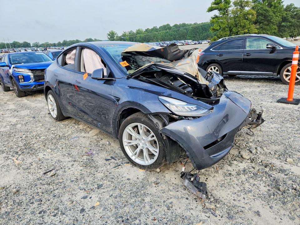 Photo 4 from auction – 2023 TESLA MODEL Y with VIN 7SAYGAEE4PF611639