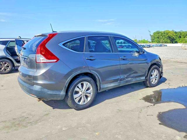 Photo 3 from auction – 2014 HONDA CR-V with VIN 2HKRM3H74EH565621
