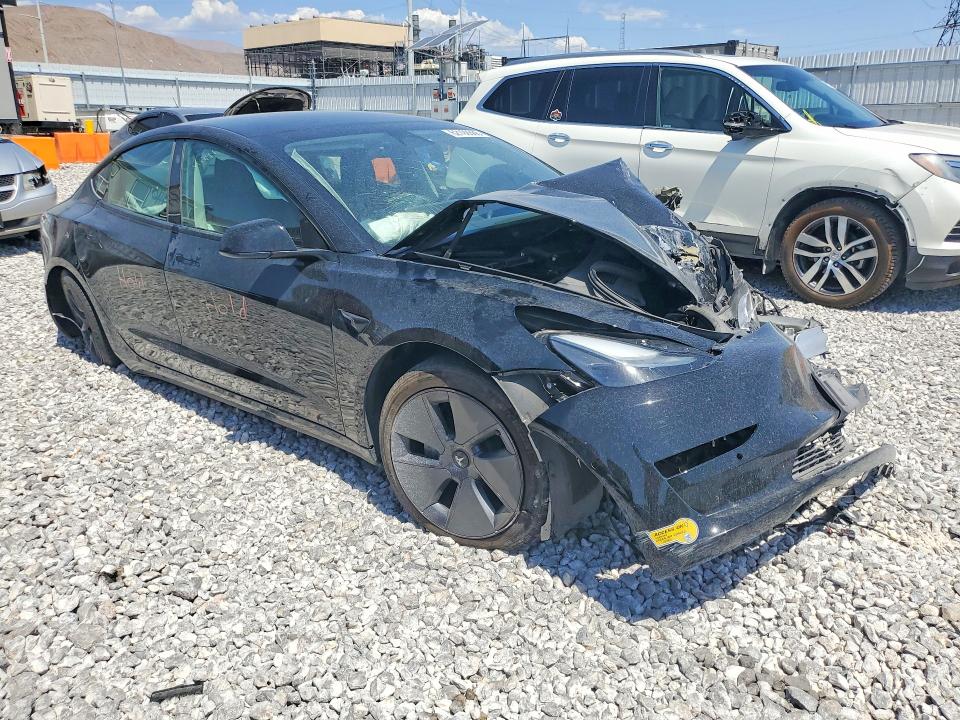 Foto 4 de la subasta – 2022 TESLA MODEL 3 con VIN 5YJ3E1EA6NF301855