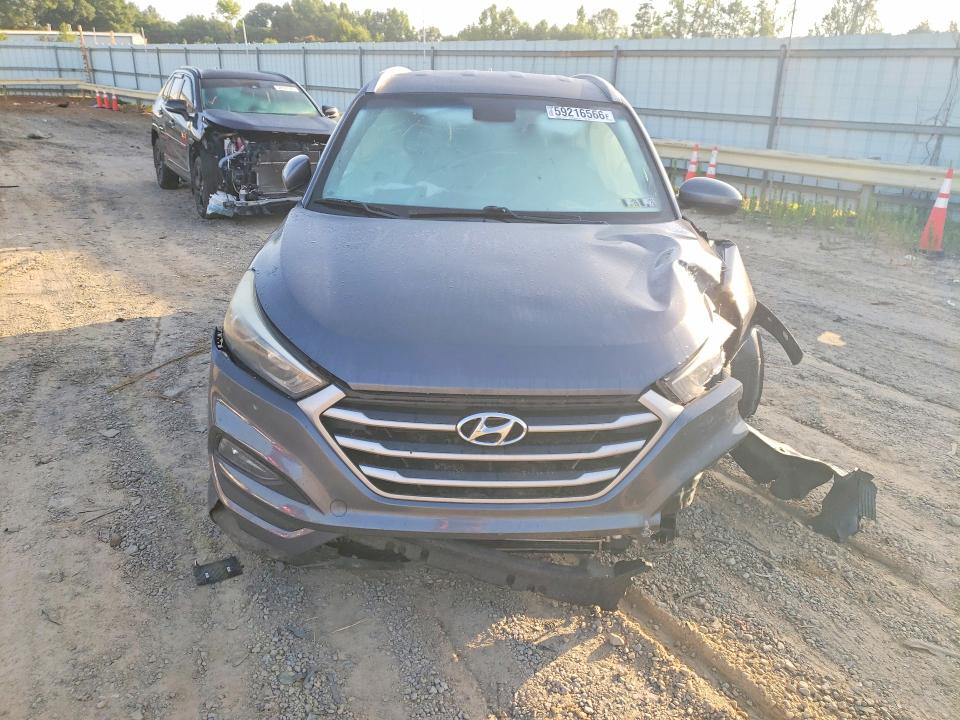 Photo 5 from auction – 2018 HYUNDAI TUCSON with VIN KM8J3CA45JU735108