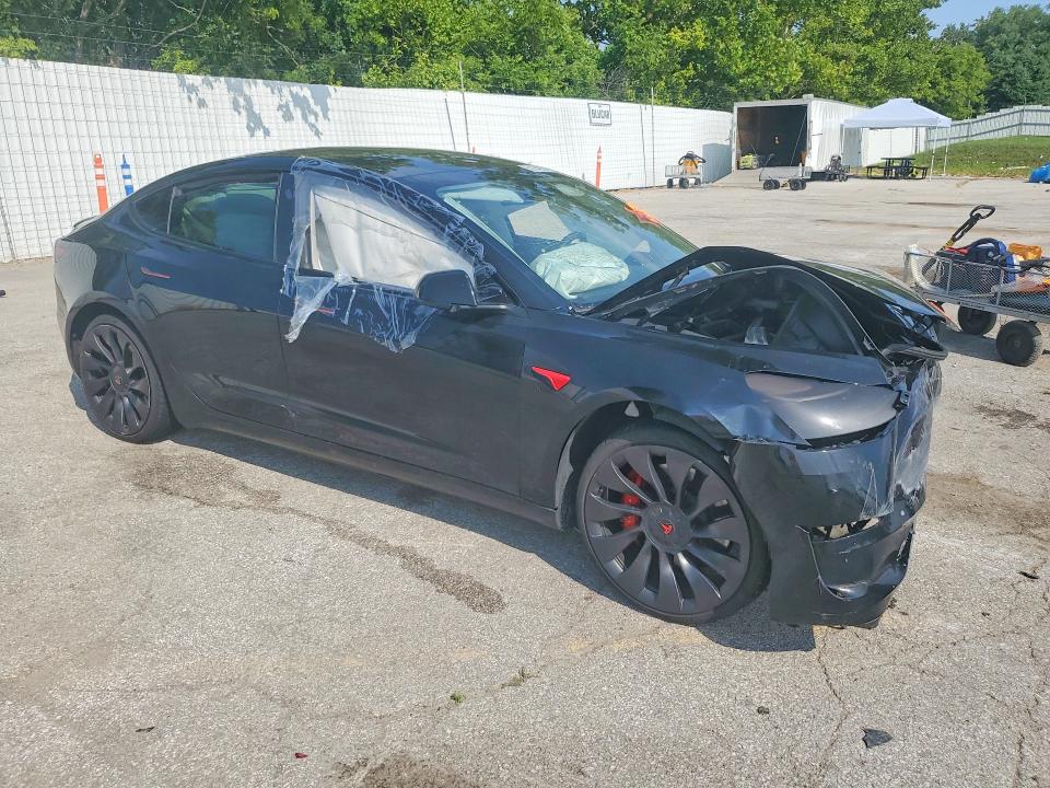 Photo 4 from auction – 2023 TESLA MODEL 3 with VIN 5YJ3E1EC3PF703630