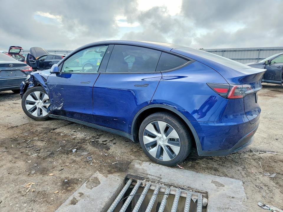 Photo 2 from auction – 2023 TESLA MODEL Y with VIN 7SAYGAEE4PF879140