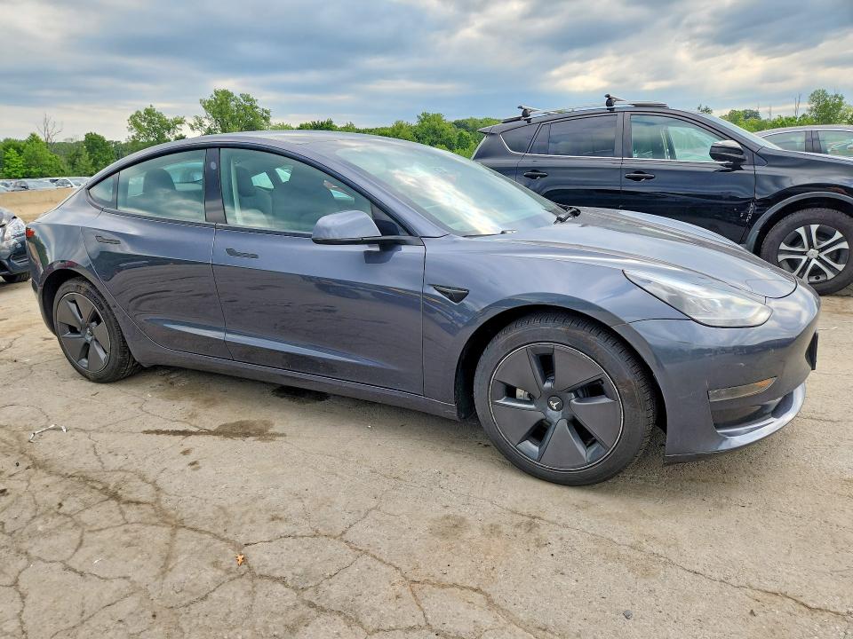 Photo 4 from auction – 2023 TESLA MODEL 3 with VIN 5YJ3E1EA7PF700051
