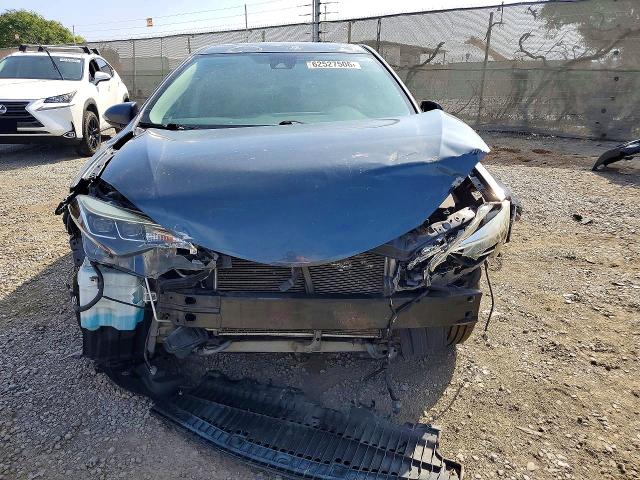 Photo 5 from auction – 2018 TOYOTA COROLLA with VIN 5YFBURHE2JP785176