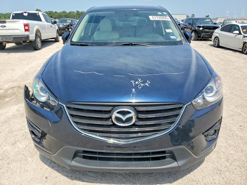 Photo 5 from auction – 2016 MAZDA CX-5 with VIN JM3KE2DY1G0841140