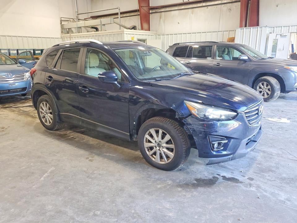 Photo 4 from auction – 2016 MAZDA CX-5 with VIN JM3KE4CYXG0640334