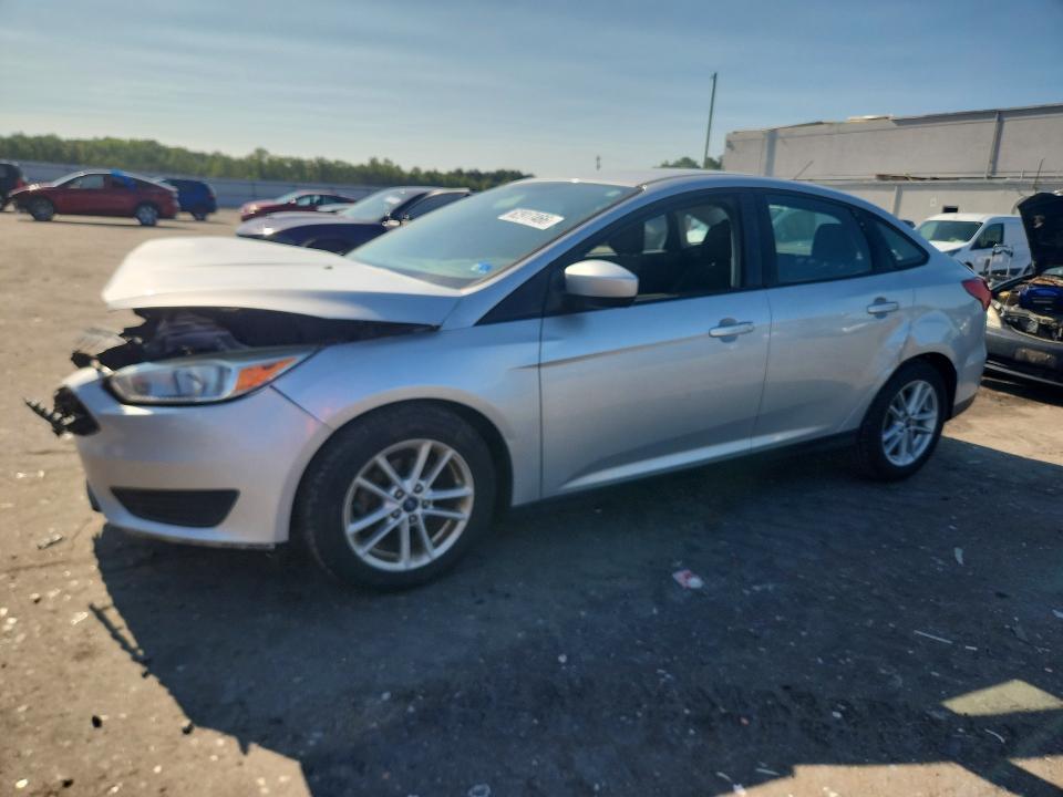 FORD FOCUS 2018 with VIN 1FADP3F23JL319972 - Photo from auction