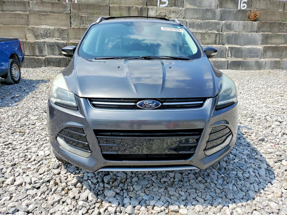 Photo 5 from auction – 2016 FORD ESCAPE with VIN 1FMCU9J99GUA90363