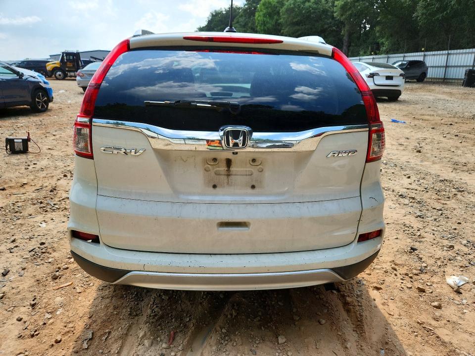 Photo 6 from auction – 2016 HONDA CR-V with VIN 5J6RM4H71GL114967