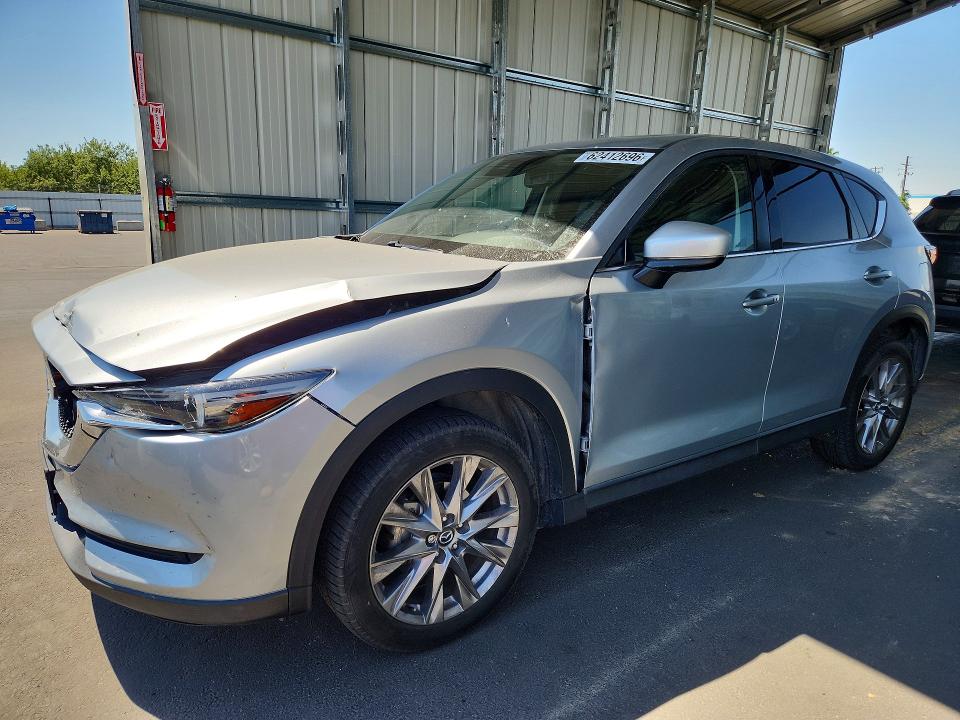 MAZDA CX-5 2021 with VIN JM3KFADM7M1395635 - Photo from auction