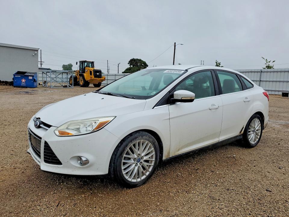 FORD FOCUS 2012 with VIN 1FAHP3H28CL309925 - Photo from auction