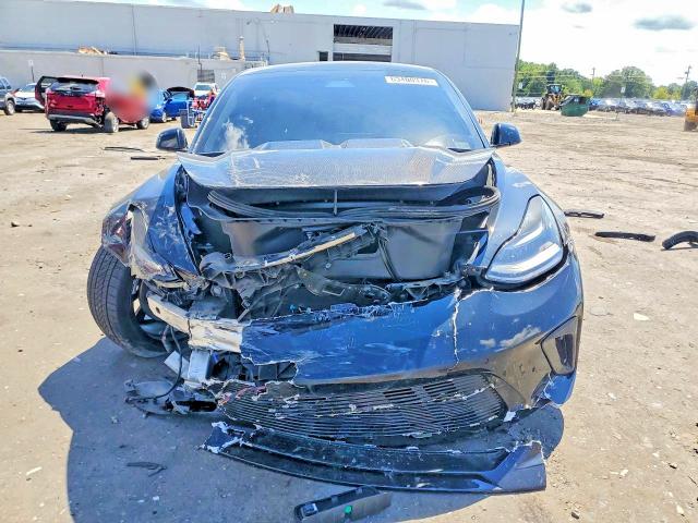Photo 5 from auction – 2021 TESLA MODEL 3 with VIN 5YJ3E1EB9MF046352