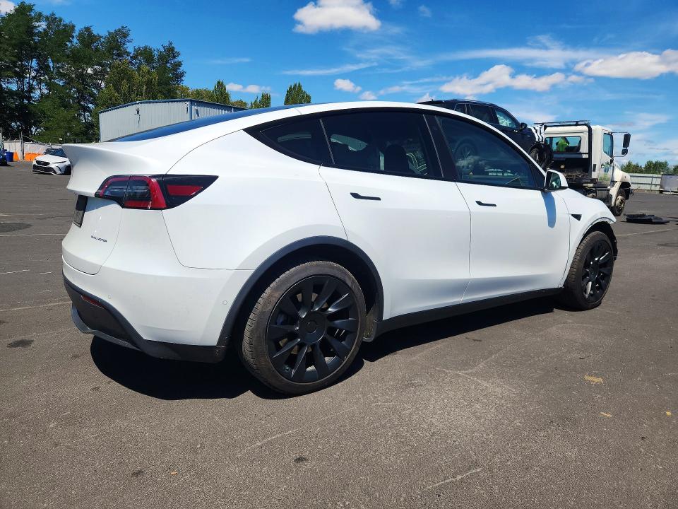 Photo 3 from auction – 2022 TESLA MODEL Y with VIN 7SAYGDEE8NF558491