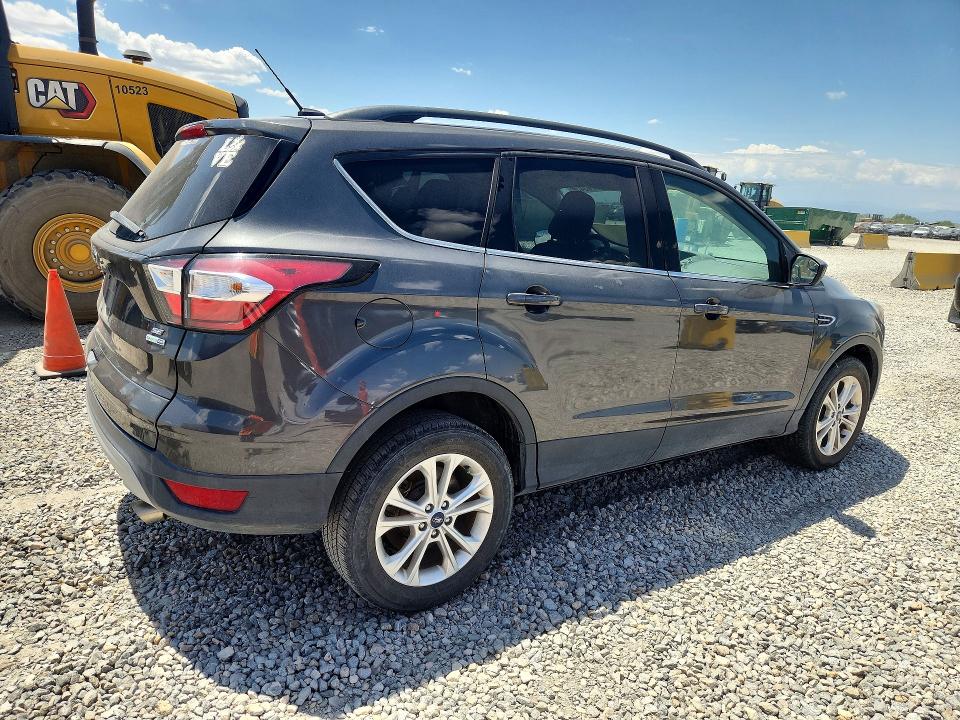 Photo 3 from auction – 2018 FORD ESCAPE with VIN 1FMCU9GDXJUB46880