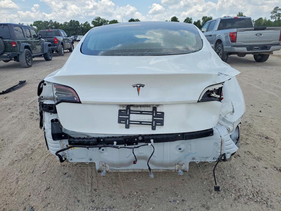 Photo 6 from auction – 2021 TESLA MODEL 3 with VIN 5YJ3E1EA4MF988929