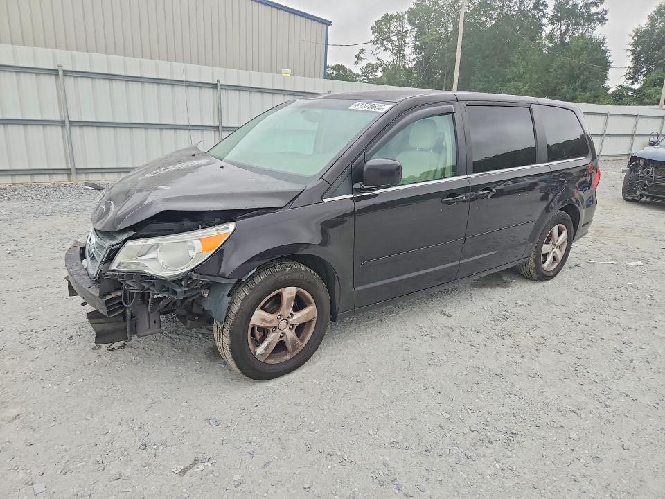VOLKSWAGEN ROUTAN 2010 with VIN 2V4RW3D19AR388059 - Photo from auction
