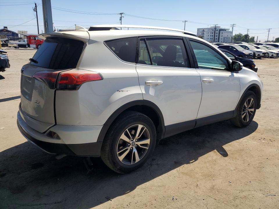 Photo 3 from auction – 2016 TOYOTA RAV4 with VIN 2T3WFREV8GW270522
